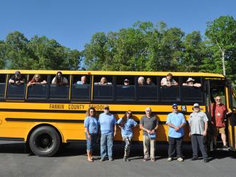  Fannin County School System bus drivers were very excited to show off their skills and compete in the Bus Rod-eo event. In the front are, from left, Denise M. Messer, Jimmy Adams, Pepperr McConnell, Greg O’Neal, Rodney Ensley, Tom Cook, and in the door Tommy Jourdan. Inside the bus are, from left, Transportation Director Chris Drury, Charlotte Graham, Destiny Cheatham, Brandon Tipton, Julie Johnson, Melissa Beaver, Robin Searcy, Superintendent Shannon Dillard, Lisa Cheatham, and Billy Standridge.