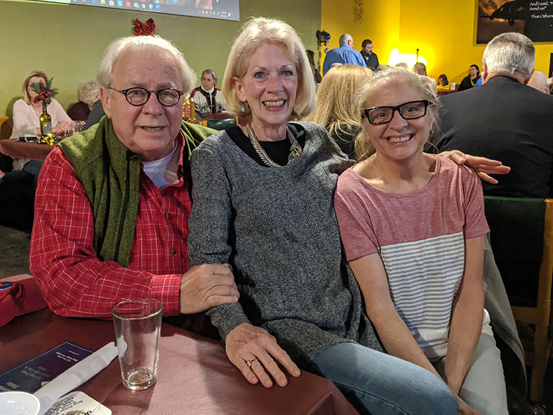 Dog advocates and Freedom for Fido volunteers Kirk Williams, Libby Young and Dana Worm have fun at the recent fundraiser for the new non-profit group that has, since April, already built fences for four families, freeing 10 dogs from lives of confinment.