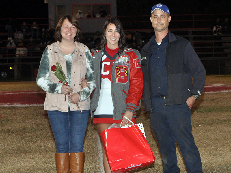 Senior Cheerleader Rebecca O’Neal was honored at Copper Basin’s last home football game Friday, November 6. O’Neal is shown with her parents Craig and Crystal O’Neal.