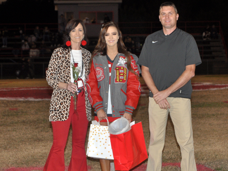 Lady Cougar senior cheerleader Riley Smith was honored during the senior night ceremony at Copper Basin High School Friday, November 6. Smith is shown with her parents, Kevin and Holly Smith.