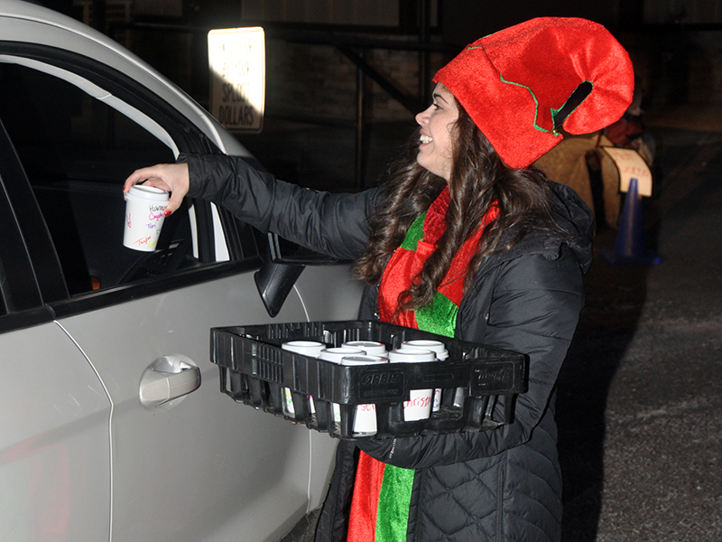 Hannah Fortenberry passed out hot chocolate to people that came to see Santa Claus at the Fannin Recreation Department.