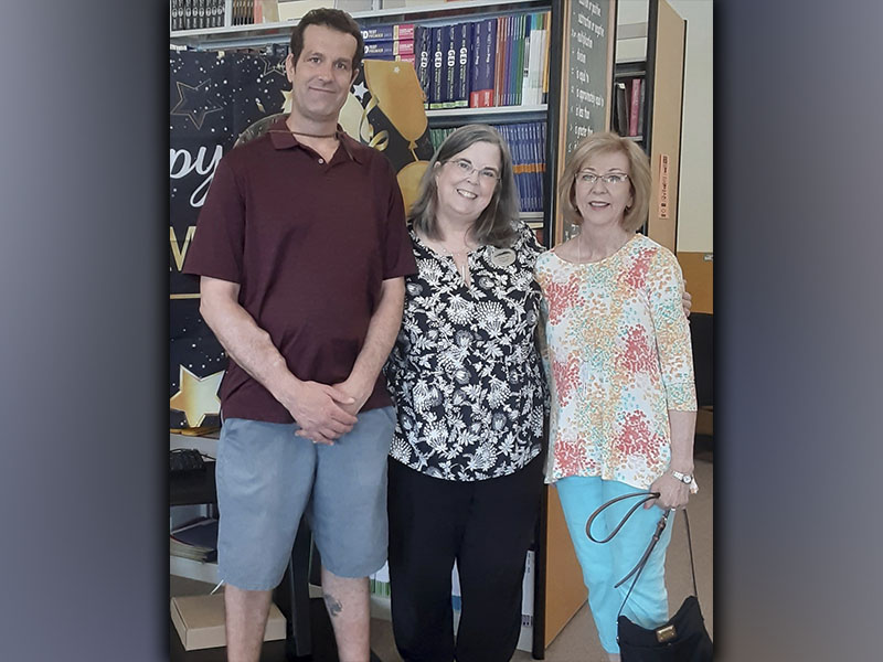 Fannin Literacy Action Group (FLAG) former student and graduate as well as a volunteer tutor celebrated with Donna Earl during her retirement reception Wednesday, June 9. Shown during the reception are, from left, former student and graduate Brian Ammann, Earl and vounteer tutor Kathy Barber. 