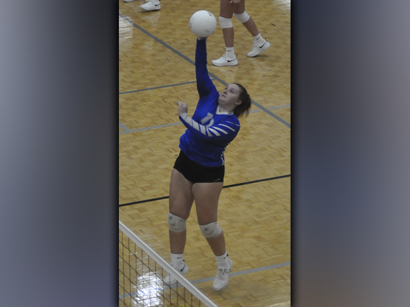 Lady Rebel Kaylie Kendall spikes the ball during a recent match for the Lady Rebels volleyball team.