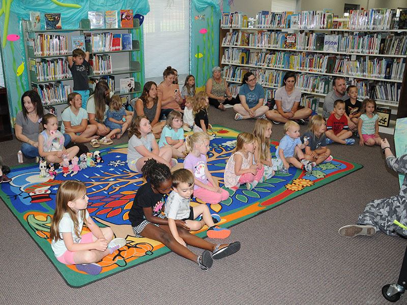 A summer filled with programs was kicked off with “Oceans of Possibilities Storytime” Wednesday, June 1, at the Fannin County Public Library in Blue Ridge. Children and parents listened to Hannah Loudermilk get the program started. 