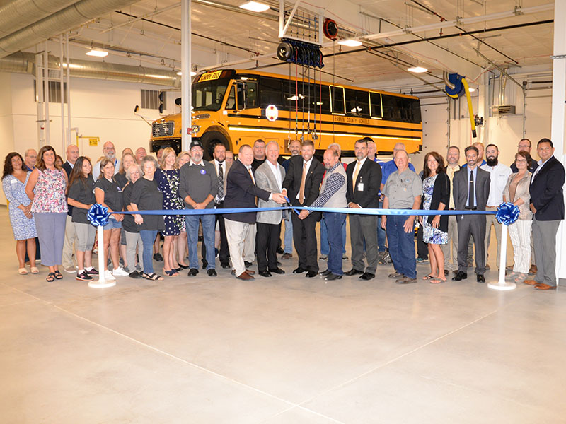 Fannin County school system officials, transportation department employees, contractors and community leaders gathered August 18 to cut the ribbon officially marking the dedication of the system’s new Transportation Facility. 