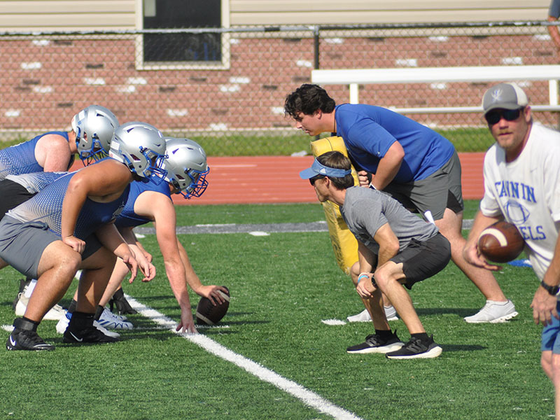 Fannin County High School football linemen work with Offensive Coordinator Chris Thigpen and  Defensive Line Coach Jacob Reece at practice Wednesday, July 27.