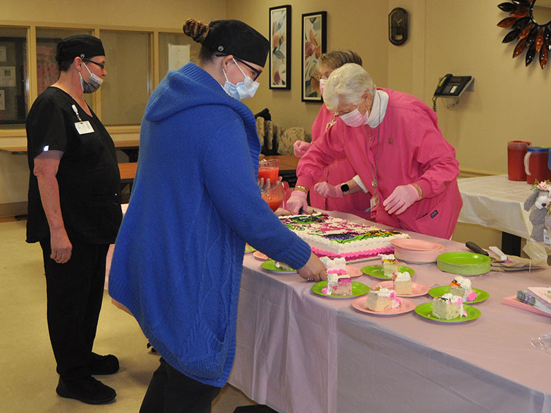 Fannin Regional Hospital employees Brenda King and Denise Elliott took advantage of the reception March 20 hosted by the hospital Auxiliary.