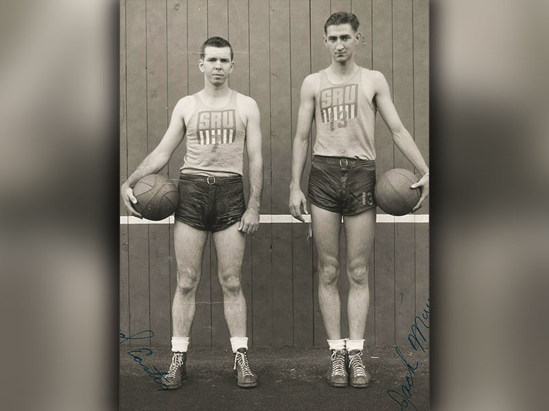 Jack Myers, right, pictured in the Navy with a basketball in hand, mid 1940’s.  