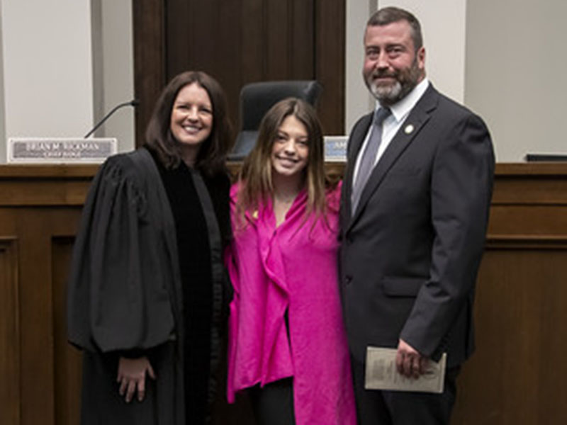 Amanda Mercier is shown with her husband, Joe Foster, and daughter, Alexandria, after taking her oath of office as the new chief judge of the Georgia Court of Appeals. Her term officially begins July 1.
