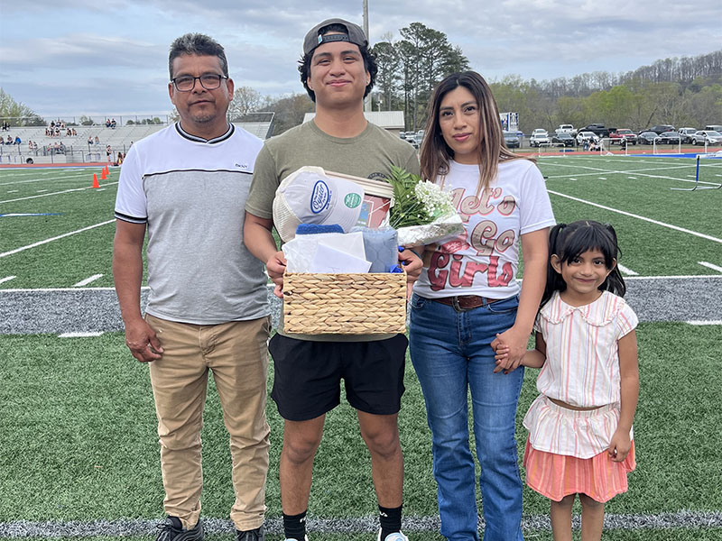 Jahir Leal was joined by his family as he accepted Senior Night Track and Field honors April 8 at Fannin County High School.