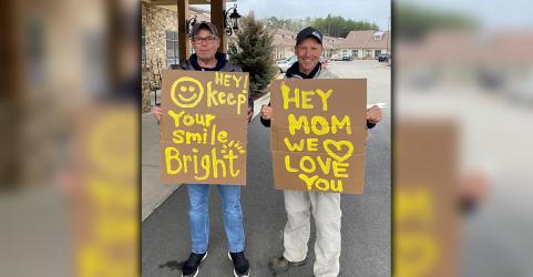 Jeff Pierce and Ryan Pierce created signs to cheer their mom, Blue Ridge Assisted Living & Memory Care resident Carolyn Pierce, who is unable to receive visitors during the COVID-19 pandemic.