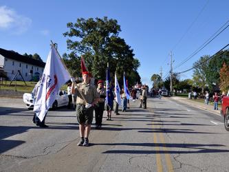 Local Boy Scouts of America, led by Ethan Jolly, led the Mountain Patriots’ “God & Country” parade and rally through downtown Blue Ridge.