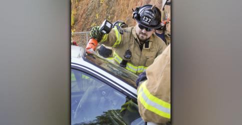 Fannin County firefighter Jacob Queen uses a specially designed rescue tool to cut through the windshield of a car. This was part of an extrication refresher course taught last week that 18 Fannin firefighters attended.