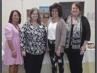Fannin Literacy Action Group (FLAG) volunteers celebrated with Donna Earl during her retirement reception Wednesday, June 9. Shown during the reception are, from left, Paula Ary, Earl, Jackie Morgan and Shelby Ward. 