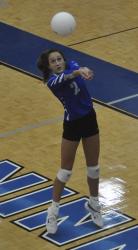 Lady Rebel Reigan O’Neal keeps a volley alive in recent action for the Lady Rebels volleyball team.