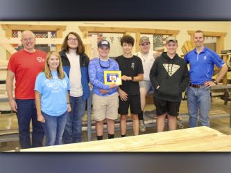 Fannin County High School wood shop students took first place in Freedom for Fido’s dog house contest in the amateur category. Shown are, from left, Freedom for Fido founders Fritz and Jackie Gilbert, students Jonah Couch, Silas Campbell, Griffin Disser, Ethan Conner, Connor Fisher and construction teacher Daniel Stewart.
