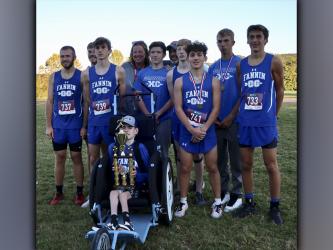 The Fannin County Rebels Cross Country team took home second place in their GHSA Region 7AA Championship Tuesday, October 26, at Pepperell High School. Shown following the meet are, from left, front, Brady Smith; and back, Samuel Jabaley, James Kyle, Phoenix Leifer, coach Suzianne Pass, Samuel McGill, coach Mike Cosentino, Luke Callihan, Zechariah Prater, Gavin Davis and Ben Bloch.