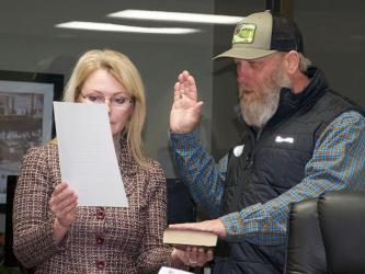Andy Bowen is shown taking his Oath of Office with Blue Ridge Mayor Rhonda Haight Monday, Feburary 7, after Bowen was appointed to the downtown development authority by the city council.