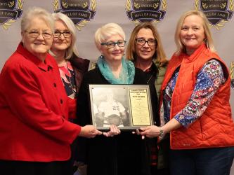 Patty Callihan’s plaque was received by family and teammates at the Sports Hall of Fame Ceremony April 9.