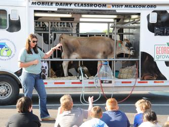Nicole Duvall with Georgia’s Mobile Dairy Classroom talks with East Fannin fifth graders about dairy production in Georgia during her visit last week.