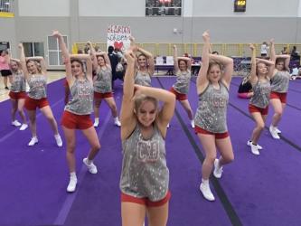 Members of the Copper Basin High School Cheer Squad work on one of their routines during the Universal Cheerleaders Association Cheer Camp at Tennessee Tech University.