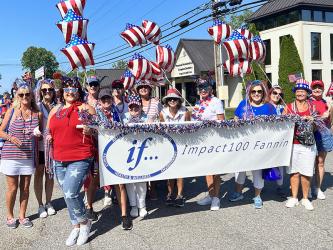 Members of Impact100 Fannin walked in the Old Timers Parade July 4 through downtown Blue Ridge. 