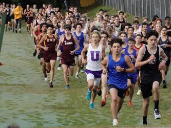 Zechariah Prater leads the pack in the Cross Country race at Murphy High School, Prater would end up finishing fourth and the Rebels team would finish third out of 11 competing teams. 