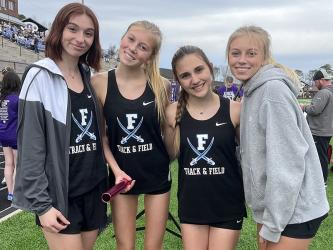 The Fannin County girls’ 4x800 relay team smiles after a victory at a recent track and field meet. Shown are, from left, Caylee Gaddis, Lindsey Holloway, Karli Sams, and Carlee Holloway. 