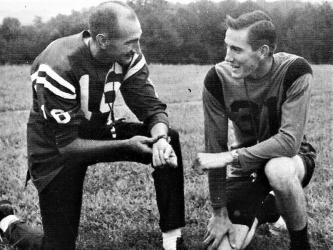 Jack Myers and Roscoe Nash work together as East Fannin Coaches in 1965.