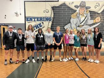 The Fannin County High School track and field teams had many athletes medal in the Region 7AA meet at Gordon Central High School Monday, April 24. Shown are, from left, Matthew Crowder, Zechariah Prater, Grayson Willis, Bill Stiles, Nate Smith, Gage Bryan, Reigan O’Neal, Carlee Holloway, Karli Sams, Ava Acker, Lindsey Holloway and Caylee Gaddis. 