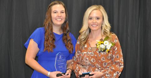 Katy Roberson, right, a first grade teacher at West Fannin Elementary School, was named as Fannin County’s Teacher of the Year at the annual banquet honored the top educators October 3 at the Fannin County Agriculture Center.  Teacher of the Year runner up, Tessa Fowler, left, is a pre-K teacher at East Fannin Elementary School 