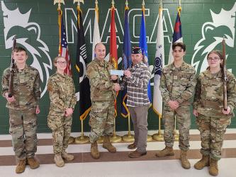 Veteran of Foreign Wars (VFW) Commander Harold Bargeron recently presented a check to Christian Junior ROTC Instructor Technical Sergeant John Tucker at Mountain Area Christian Academy. Shown during the presentation are, from left, Cadet Maxwell Scott, Cadet Alyha Hawkins, Tucker, Bargeron, Cadet Jacob Corley and Cadet Rebekah Pickelsimer.