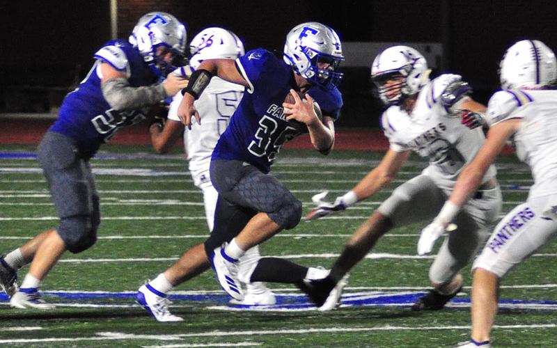 Fannin Rebel Will Mosely (35) powers through the Panther defense for a big gain during the Rebels game with the Union County Panthers Friday, September 13.