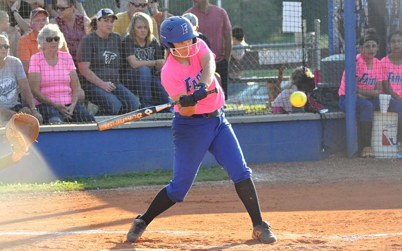 Lady Rebel Emma Mitchell unloads on a pitch in recent action for Fannin County.