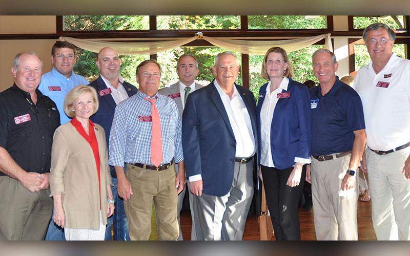 Speaker of the Georgia House of Representatives David Ralston (HD7), center, stands with other state representatives at his reception, September 17. Shown standing in support are, from left, Chairman John Corbett (HD 174), Governor’s Floor Leader Dominic LaRiccia (HD 169), Chairman Katie Dempsey (HD 13), Representative Jason Ridley (HD 6), Representative Vance Smith (HD 133), Representative Matt Barton (HD 5), Speaker Pro-Tempore Jan Jones (HD 47), Chairman Eddie Lumsden (HD 12), and Chairman Rick Jasperse