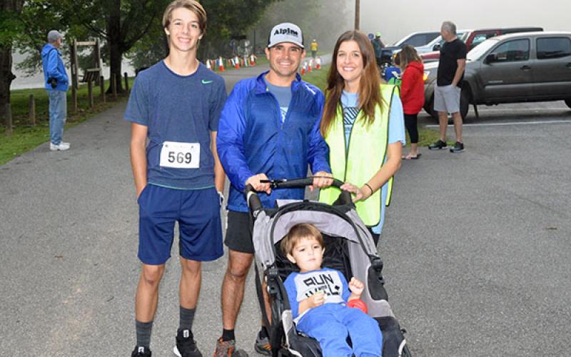 Runners and helpers pictured are, from left, front, Wilder Petrillo; back, Carter Mann, AJ Petrillo and Jamie Petrillo wait for the 5K to get started during the Boys &amp; Girls Club of North Georgia Labor Day 5K River Run at Horseshoe Bend Park Saturday, August 31.