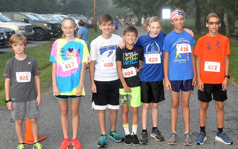 Some of the Fannin County Middle School cross country Rebels and Lady Rebels competed in the Boys &amp; Girls Club of North Georgia Labor Day 5K River Run at Horseshoe Bend Park Saturday, August 31. Runner pictured are, from left, Jonathan Bewley, Erin Jones, James Bewley, Matthew Ponton, Luke Callihan, Gavin Davis and Benjamin Bloch.