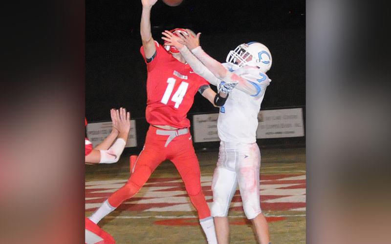 Copper Basin Cougar Logan Burkett (14) blocked this long pass against the McMinn Central Chargers.