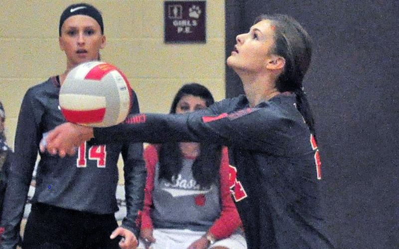 Lady Cougar Albani Dotson keeps a volley alive in recent action for the Copper Basin.