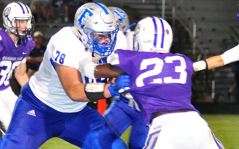 Rebel lineman Miles Johnson (78) blocks a Cherokee Bluff defender during Fannin County’s region football game with the Bears Friday, October 4.