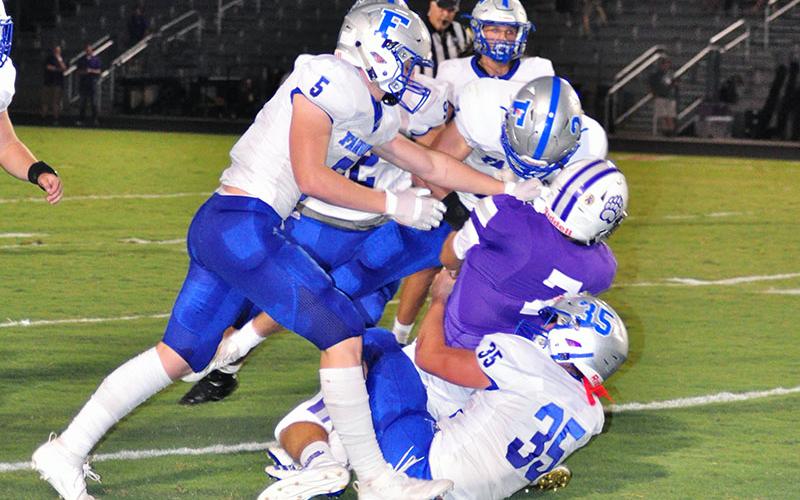 The Fannin defense had a great outing against the Bears Friday, October 4. The Rebels gave up only seven points through four quarters. Rebels Seth Reece (5), Carson Beavers (2) and Will Mosely (35) gang tackle a Cherokee Bluff ball carrier during the Rebels region win against the Bears Friday, October 4.