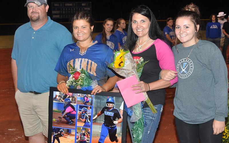 Eryn Mealer was one of five senior Lady Rebels to be recognized after the Lady Rebels game with Lumpkin County Thursday, September 26. Shown are, from left, Matthew Mealer, father; Mealer; Samantha Dutton, mother; and Emily Mealer, sister.