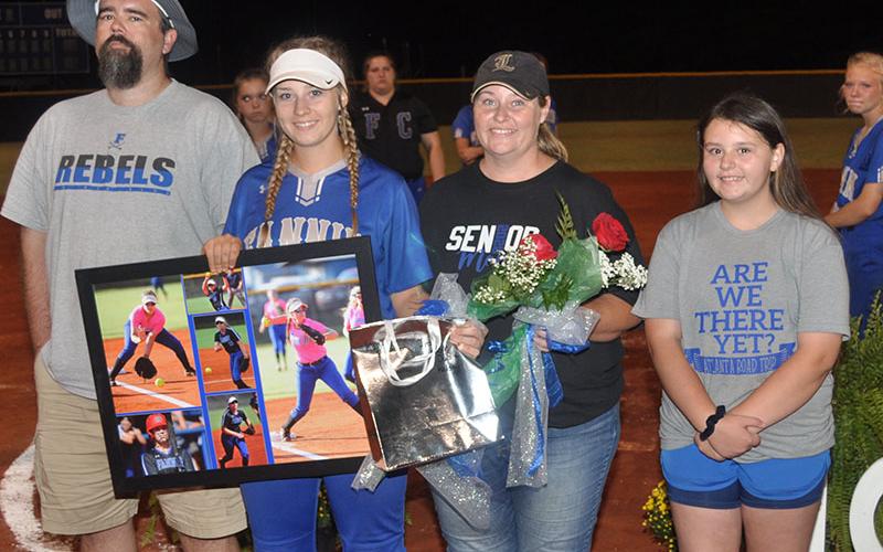 Kayleigh Russell was honored after the Lady Rebels softball game against Lumpkin County Thursday, September 26. Shown are, from left, Justin Russell, father; Russell; Tina Russell, mother; and Kelsey Russell, sister.
