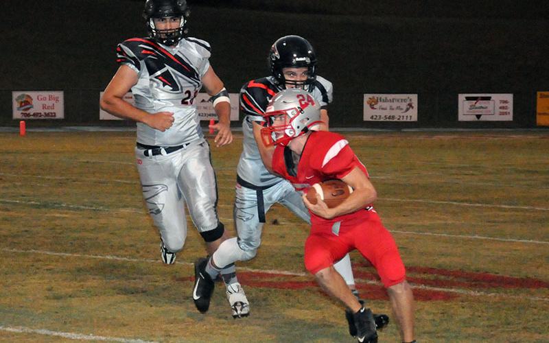 Copper Basin’s Chase Mickens looks for yardage against the North Georgia Falcons.