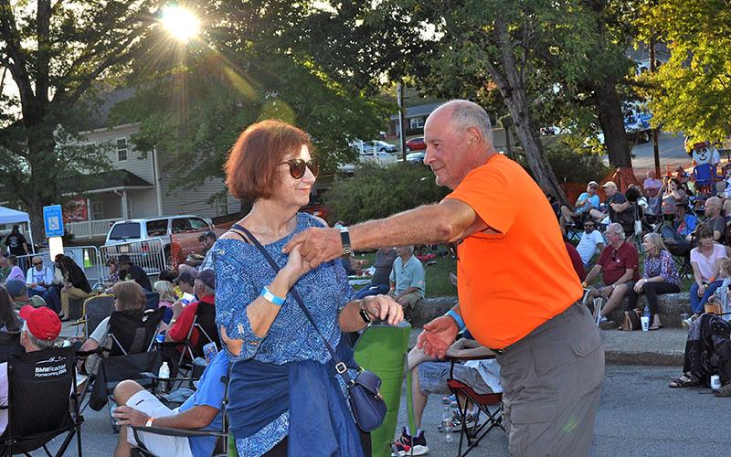 Eleanor and Mike Bliss dance the evening away to blues tunes at the Blue Ridge Blues &amp; BBQ Festival in downtown Blue Ridge, Saturday September 21.