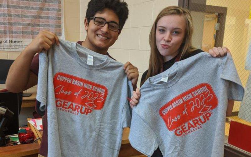 Copper Basin High School students Krus Soto, left, and Isabella Brown display their Class of 2023 Commitment to Graduate t-shirts following the Commitment to Graduate banner signing ceremony.