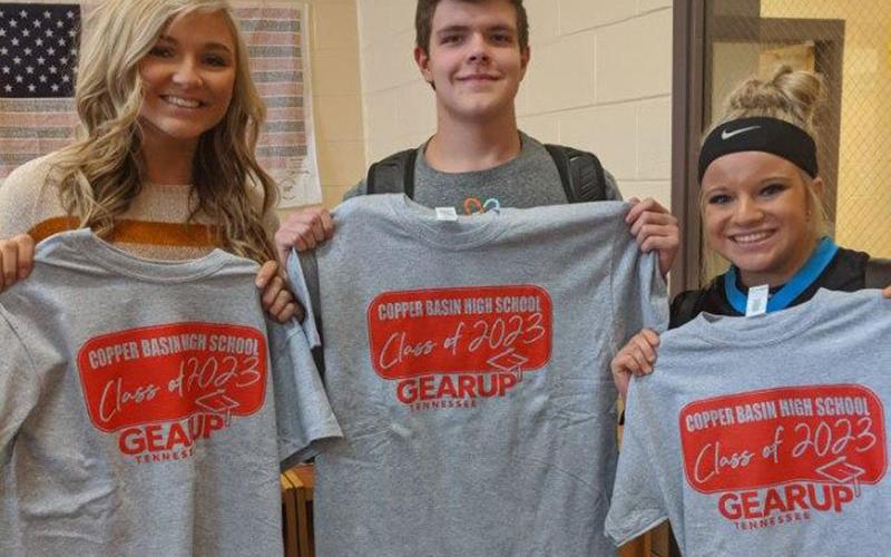 Copper Basin High School Class of 2023 students participated in the Commitment to Graduate banner signing ceremony before displaying their commitment t-shirts. Shown are, from left, Sapporiah Ross, Ross Stillwell and Destiny Pittman.