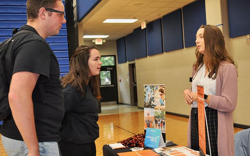 Fannin County High School students attended the Probe College Fair and spoke with college representatives Friday, October 25. Zachary Nelson and Haley Parks are shown speaking with Sage Cudney from Mercer University.