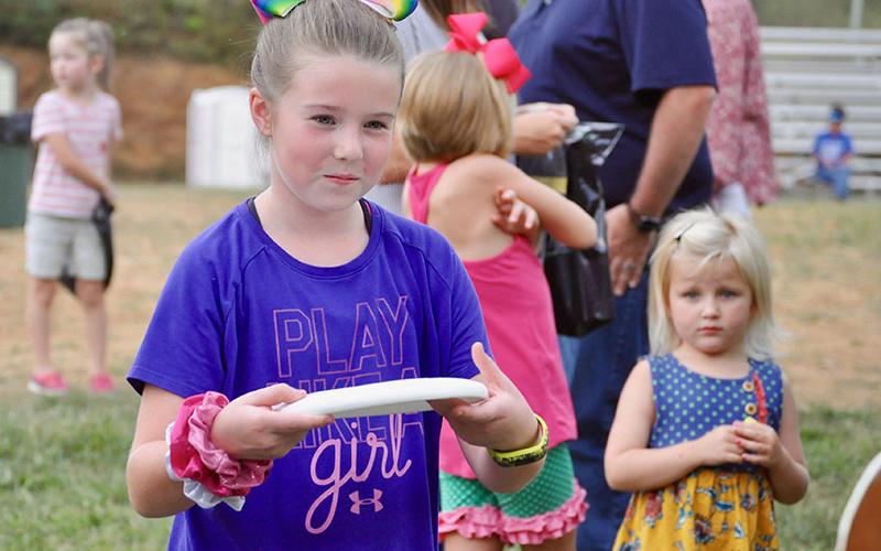 Taber Pass had her game face on as she tossed her frisbee in one of the booths at Fannin County elementary schools’ Fall Festival Friday, September 27. The event was held at the Kiwanis Fairgrounds.