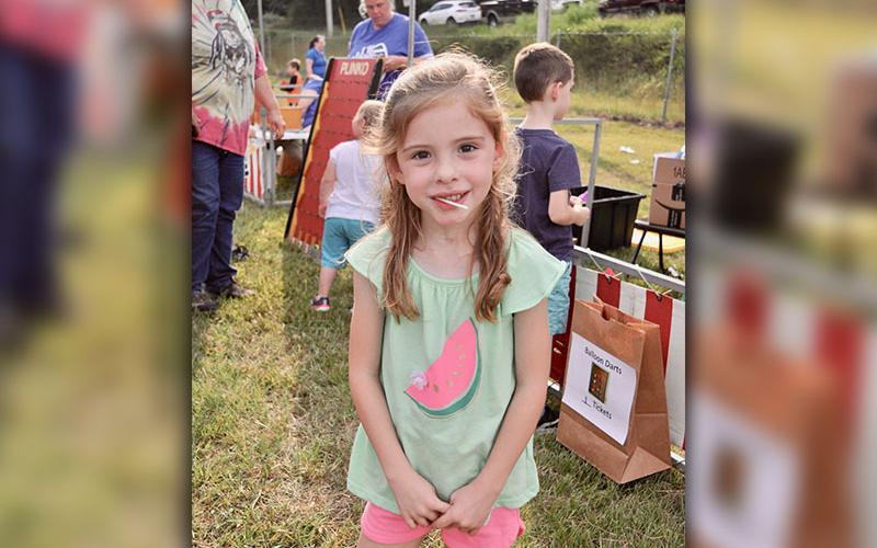 Bristol Erwin enjoyed her prize lollipop at Fannin County elementary schools’ Fall Festival.